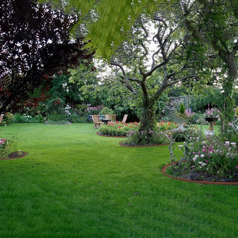 Garden view using 33Ft Landscape Edging Kit With Four Inch High Paver Border Edging And 30 Stakes Included Keeps Flower Beds, Lawns, Neat