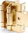 Close-up of 50 Pack Half Inch Overlay Brushed Gold Cabinet Hinges For Face Frame Cabinets, stacked and semi-concealed view.