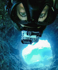 Diver using Dive Housing Bundle for HERO4 and HERO3 Series Action Cameras, Waterproof to 197 Feet, in underwater cave.