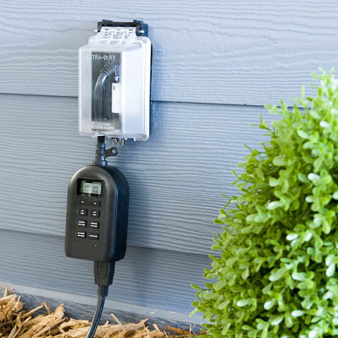 Weatherproof Outdoor Outlet Cover For Single Gang Electrical Box, UV Stabilized Polycarbonate, Black, installed on wall.