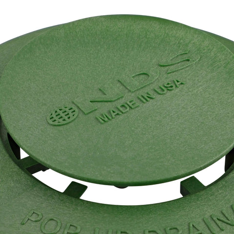 Close-up of Easy Install Workhorse Pop Up Drainage Emitter For 3-Inch And 4-Inch Sewer And Drain Fittings, green plastic lid