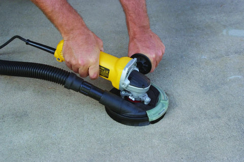 Person using Universal Dust Shroud Attachment For Angle Grinders That Handles 6 To 9 Inch Sizes With Rugged Glass Filled Nylon Build Sliding Front