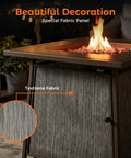 50,000 BTU Propane Fire Pit Table, 28 Inch Square, showing flame and textilene fabric panel in a cozy outdoor evening setting