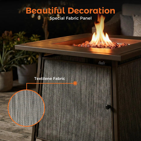 50,000 BTU Propane Fire Pit Table, 28 Inch Square, showing flame and textilene fabric panel in a cozy outdoor evening setting