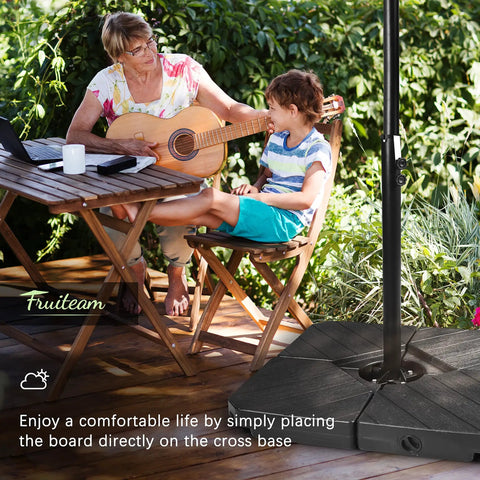 Beefy Heavy Duty Patio Offset Umbrella Base Stand With 180 Lb Sand Or Water Fill Capacity in garden scene with umbrella and table.
