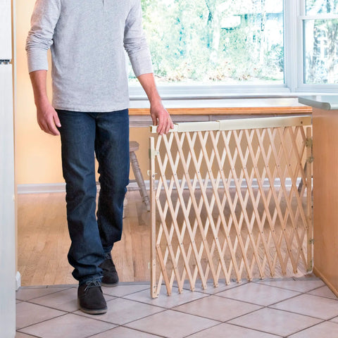 Expansion Walk Thru Room Divider Baby Gate In Natural Wood fits openings from 24 to 60 inches wide standing 32 inches tall in use.