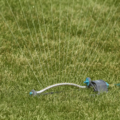 Adjustable Rectangular Lawn Sprinkler With Dial Spray Patterns Left Right Center Or Full For Massive Yard Coverage Hose Sprinkler For Lawn And Garden Gray Covers Up To 3000 Sq Ft on grass