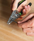 Hand using Stainless Steel Wire Stripper For 10-18 AWG Solid And 12-20 AWG Stranded, Heavy Duty Stripper Cutter And Crimper Tool