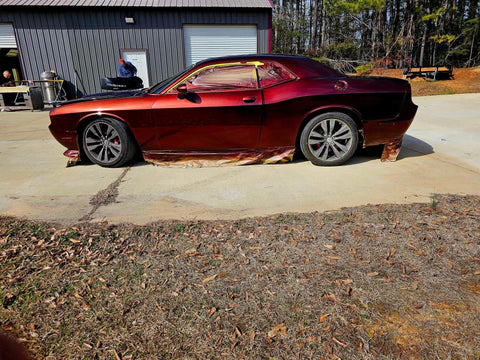 Molten Merlot Professional Car Paint Basecoat Full Gallon Volume applied on a customized vehicle side view ready for finishing.