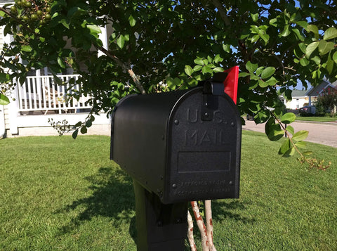 Admiral Aluminum Textured Black Post Mount Mailbox with rust proof construction in garden setting
