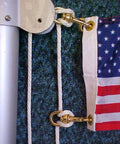 Flag secured with Paracord 550 Nylon Rope For Camping And Hiking, a real workhorse utility cord, quarter inch thick, white.