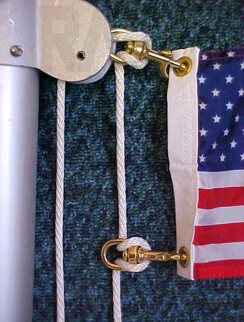 Flag secured with Paracord 550 Nylon Rope For Camping And Hiking, a real workhorse utility cord, quarter inch thick, white.