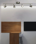 Talida 4 Light LED Ceiling Track Lighting Fixture In Brushed Nickel For Living Room, Dining Room, And Kitchen Go-To Modern Ceiling Light Using Energy Efficient LED Bulbs in a modern kitchen setting