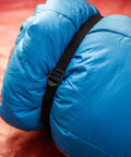 Rolled sleeping bag with black strap showing Two Pack 48 Inch Sleeping Bag Straps With Quick Release Buckles For Universal Fit