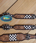 Top Shelf Western Leather Horse Tack Set Bringing The Boss Vibe To Every Ride With A Custom Headstall And Breast Collar Hand Carved With Vibrant Floral Patterns And Durable Antique Copper Hardware detail close-up of floral carving and checkered pattern on leather collar