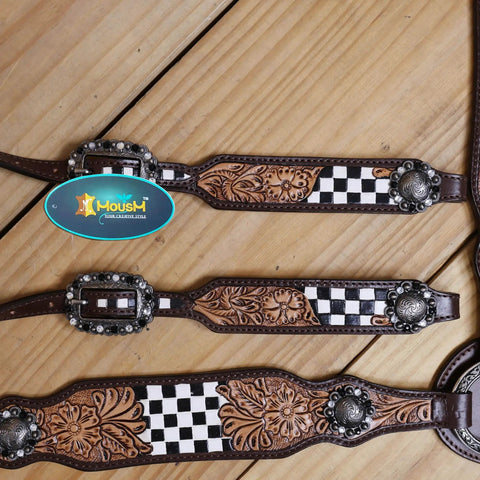 Top Shelf Western Leather Horse Tack Set Bringing The Boss Vibe To Every Ride With A Custom Headstall And Breast Collar Hand Carved With Vibrant Floral Patterns And Durable Antique Copper Hardware detail close-up of floral carving and checkered pattern on leather collar