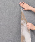 Thick Peel And Stick Wall Covering Roll With Integrated Soundproof Foam and Heavy Duty Cloth Texture being applied to a wall.