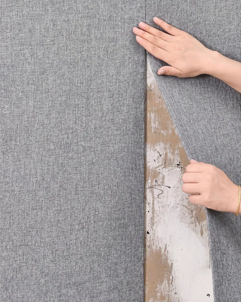 Thick Peel And Stick Wall Covering Roll With Integrated Soundproof Foam and Heavy Duty Cloth Texture being applied to a wall.