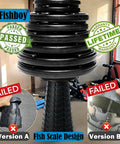 Upgraded Collapsible Camping Stool With 400 Lb Capacity showing fish scale design and failed versions in a garage setting.