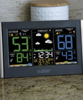 Smart Weather Station With Custom Alerts And Wireless Outdoor Sensor displaying indoor and outdoor temperature and humidity