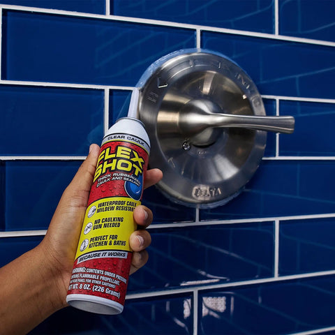 Flexible Silicone Sealant Caulk For DIY Friendly Wet Area Sealing, Waterproof And UV Resistant, No Caulk Gun Needed, Clear 8oz, 2 Pack For Kitchen, Bathroom, Showers, Sinks, And Baseboards being applied to a shower faucet on blue tile wall.