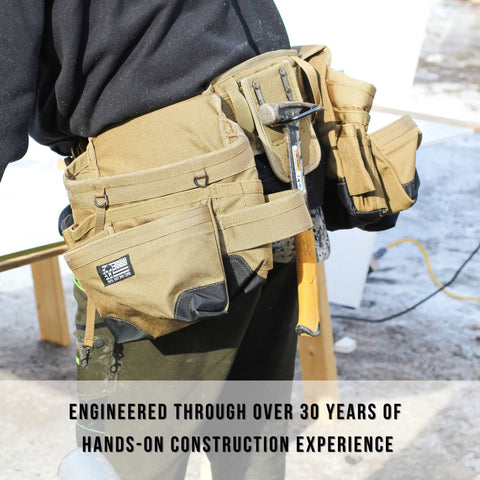 Heavy Duty Built Tough Tactical Tool Belt With Large Pouch Capacity Adjustable Fit And Lumbar Support Standalone Utility Belt For Carpenters Electricians And Roofers In Coyote Tan worn by a worker.