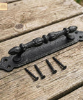Heavy Duty Cast Iron Door Pull Handles Set Of 2 In Rustic Black With Colonial Victorian Style on wooden background