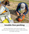 Person packing Copper Spur UL Ultralight Backpacking Tent For Two People, 3 Season Waterproof Shelter With Anodized Poles