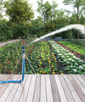 1 Inch Zinc Alloy Agriculture Spray Gun For Large Area Irrigation in use, watering farm crops with a 30-meter radius, adjustable sprinkler