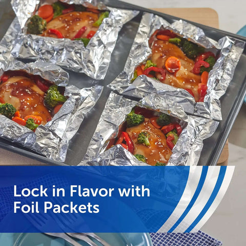 Everyday Strength Aluminum Foil Roll for freezer and grill safe cooking used for foil packets with vegetables and chicken.