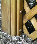 Top Shelf Construction Lag Screws 5 16 By 3 Inch Bronze Hex Fasteners 30 Pack securing wooden posts and lattice in garden project.
