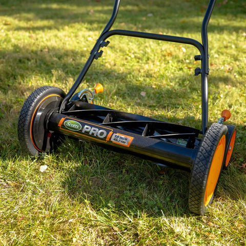 Old School 18 Inch Manual Reel Mower With 7 Blade Ball Bearing Reel Push Style on grass