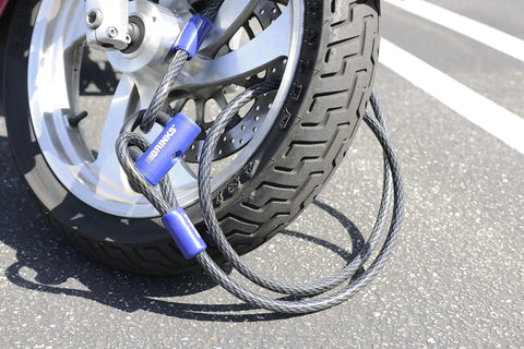 Heavy Duty Steel Braided Loop Cable With Vinyl Wrap Seven Feet Long Five Eighth Inch Diameter used to secure a motorcycle wheel