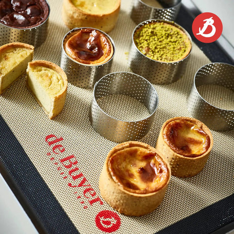 Perforated Round Tart Ring, 6 Inch Diameter And 1.4 Inch Height, Perfect For Golden Crispy Tart Crusts, Bakery Grade Bakeware, made in France on baking mat with pastries