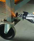 Using the Top Tier Variable Speed Rotary Tool Kit With Hella Steady Flex Shaft to cut metal, sparks flying from a bolt.