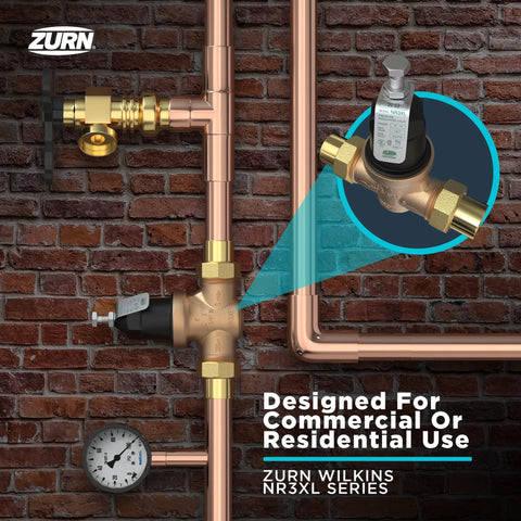 Zurn Wilkins NR3XLDU 1-1/4-in pressure reducing valve with double union FNPT connection, installed on copper piping
