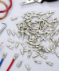 High Temperature Female Non Insulated Spade Connectors Pro Grade 100 Pack For 12 To 10 Gauge Quick Disconnect One Quarter Inch Female Tab Wire Splice Connectors For Strong Crimps In Electrical Terminals on a table with tools