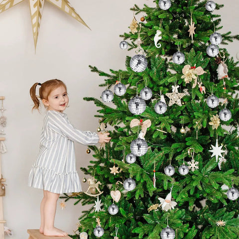 Child decorating Christmas tree with 30 Pcs Mini Disco Ball Ornaments Hanging Mirror Balls For Party Decor Wedding