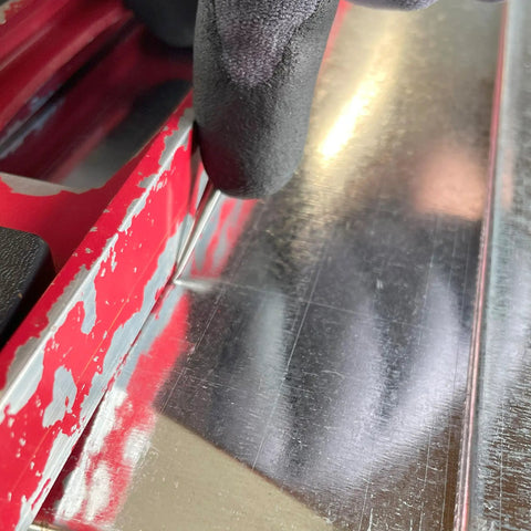 Close-up of Rock Solid Heavy Duty Three Point Five Inch Scratch Awl Forged From Premium Steel marking sheet metal line.