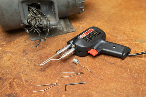 Industrial 300 Watt Soldering Gun Kit with pro grade build, quick heat up, durable metal body, and adjustable temperature in use.