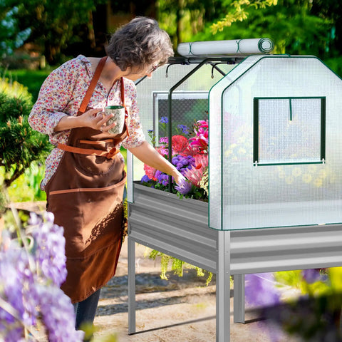 Self Watering Galvanized Raised Garden Bed With Legs And PE Cover For Vegetables And Flowers Outdoor Elevated Planter Box 48 By 24 By 56 Inches Easy Hands Free Watering For Backyard Patio Balcony with woman tending plants