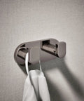 Composed Double Robe Hook in Vibrant Titanium Finish holding a white towel, mounted on bathroom wall for bath organization.