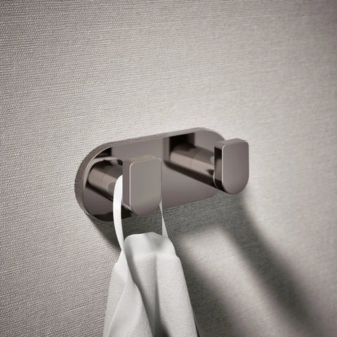 Composed Double Robe Hook in Vibrant Titanium Finish holding a white towel, mounted on bathroom wall for bath organization.
