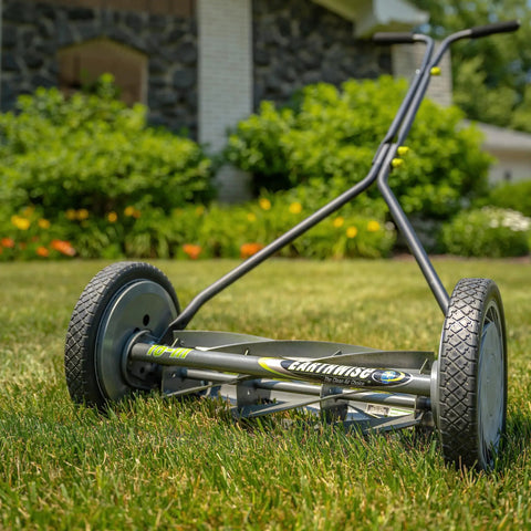 Side view of 16-Inch 7-Blade Push Reel Lawn Mower With Ball Bearing Reel And 10-Inch Composite Wheels on green lawn