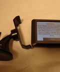 Nuvi 265 265T 3.5 Inch Bluetooth Portable GPS Navigator with mount, displaying warning screen.