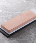 Dual Sided Knife Sharpening Whetstone With Ceramic Grit 300 And 1000 For Honing Edges, 6 Inch DM0708 on marble surface