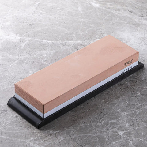 Dual Sided Knife Sharpening Whetstone With Ceramic Grit 300 And 1000 For Honing Edges, 6 Inch DM0708 on marble surface