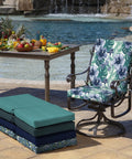 4-Pack Outdoor Patio Dining Chair Cushions 20x44 Inches, Salome Tropical Pattern, on chair by poolside near dining table.