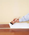 Applying Smart Prime Water Based Interior Exterior Primer Sealer White Stain Blocking Bonding Primer on wood trim surface
