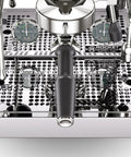 Giotto Fast V Espresso Machine Vibratory Pump controls and gauges on sleek chrome surface for precise brewing.